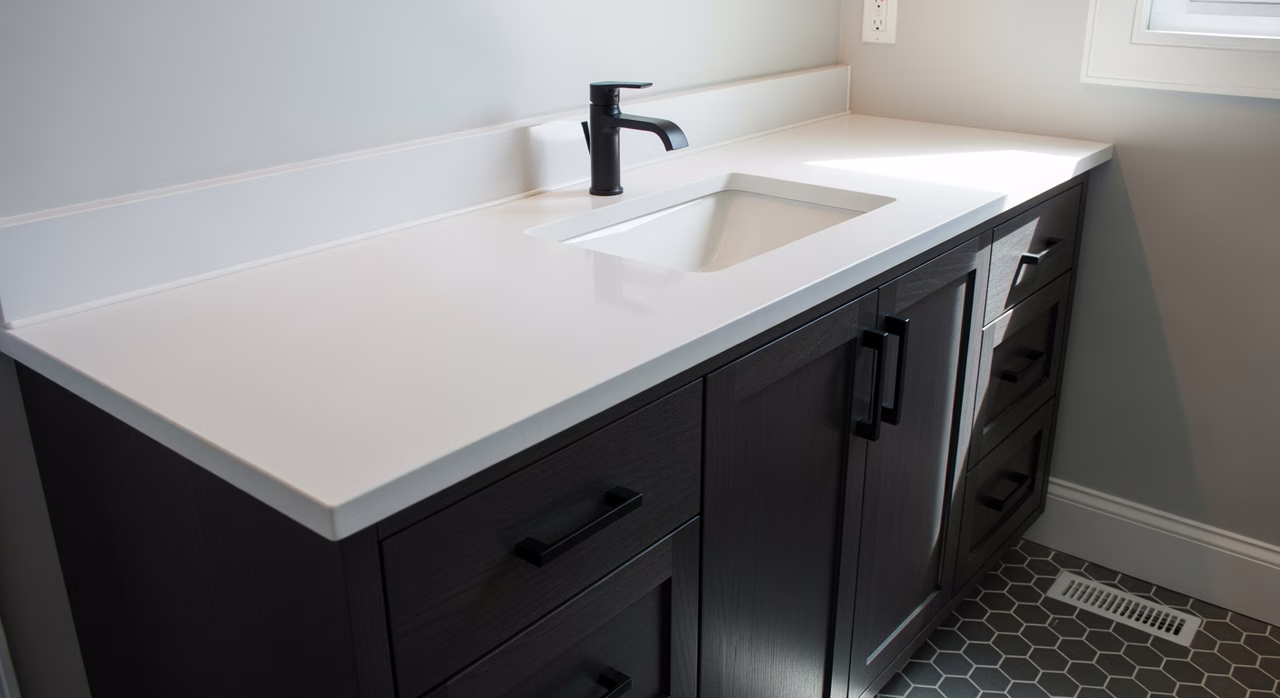Completed double vanity installation in Vaughan primary ensuite with framed mirrors and sconces